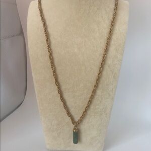 Elegant Gold Necklace with Green Pendant
